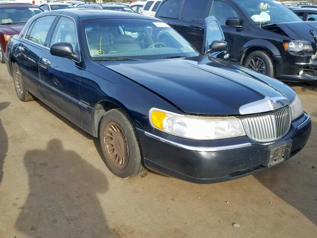 1LNHM83W7XY696272 - 1999 LINCOLN TOWN CAR C BLACK photo 1