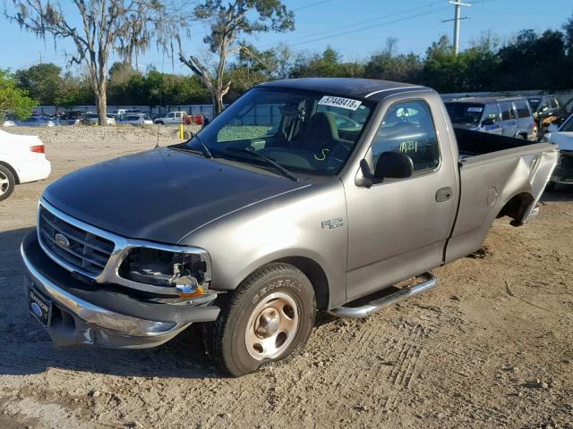 2FTRF17234CA22446 - 2004 FORD F-150 HERI GRAY photo 2