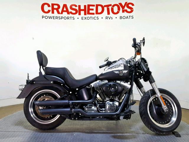 1HD1JNV14CB017326 - 2012 HARLEY-DAVIDSON FLSTFB FAT BLACK photo 1