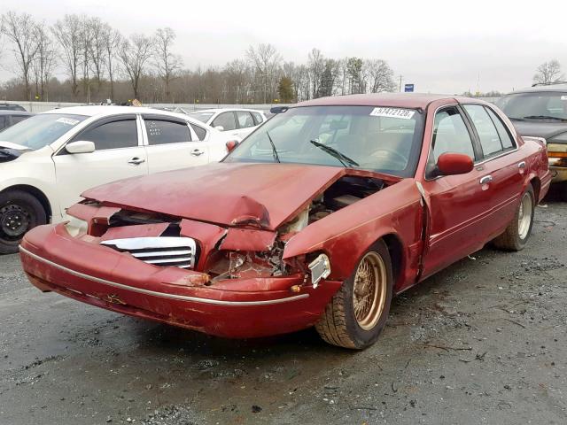 2FAFP73W9YX115956 - 2000 FORD CROWN VICT RED photo 2