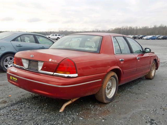 2FAFP73W9YX115956 - 2000 FORD CROWN VICT RED photo 4