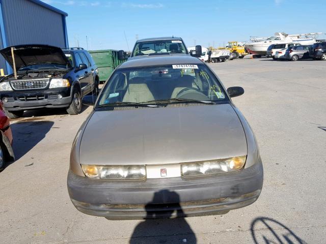 1G8ZG5283XZ230442 - 1999 SATURN SL1 GOLD photo 9