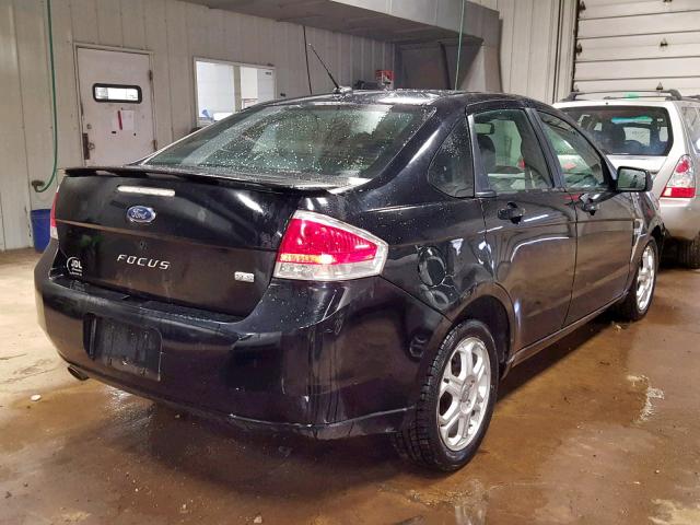 1FAHP35N98W169808 - 2008 FORD FOCUS SE BLACK photo 4