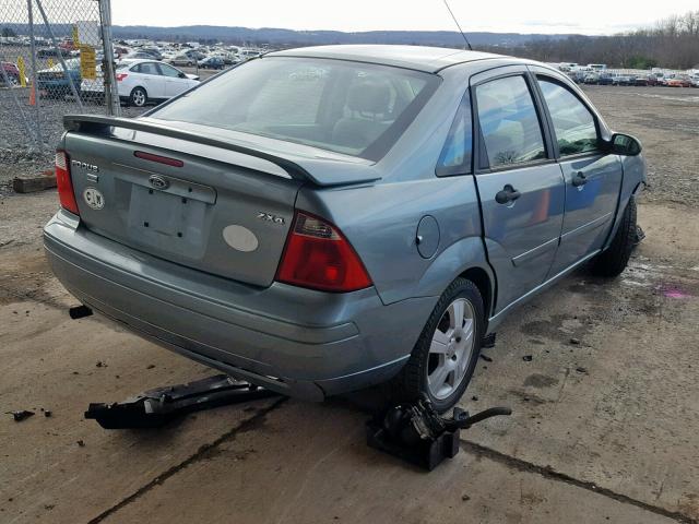 1FAHP34N75W157279 - 2005 FORD FOCUS ZX4 GREEN photo 4