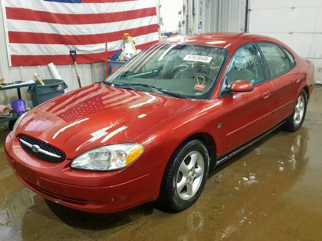 1FAFP55S5YA280832 - 2000 FORD TAURUS SES RED photo 2