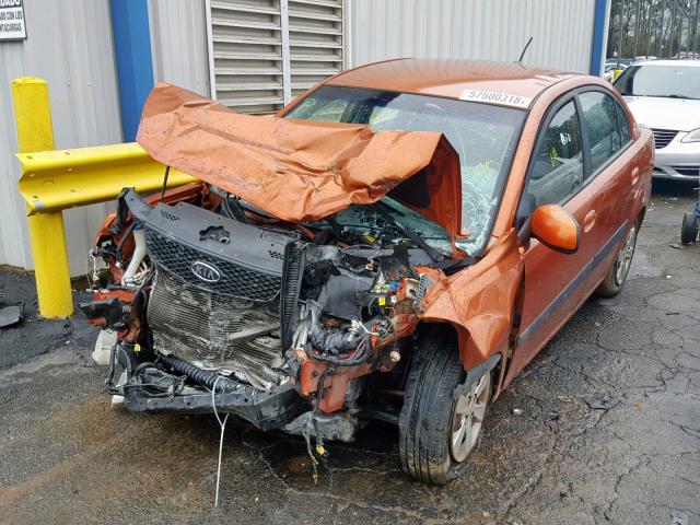 KNADE223196531589 - 2009 KIA RIO BASE ORANGE photo 2