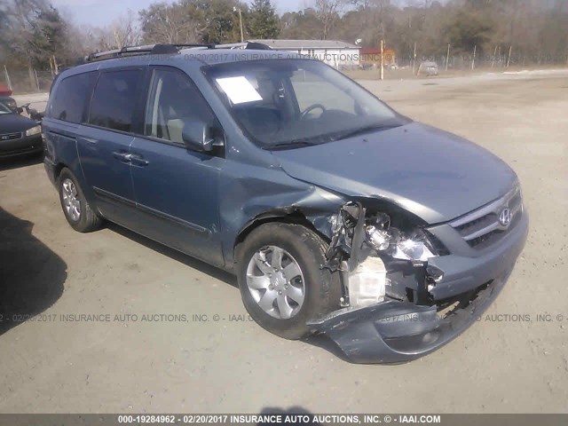 KNDMC233486045252 - 2008 HYUNDAI ENTOURAGE GLS/SE/LIMITED BLUE photo 1