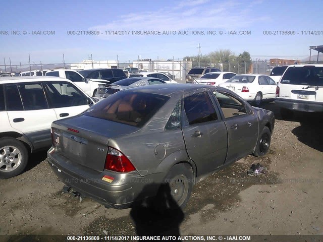 1FAFP34N85W127165 - 2005 FORD FOCUS ZX4 TAN photo 4