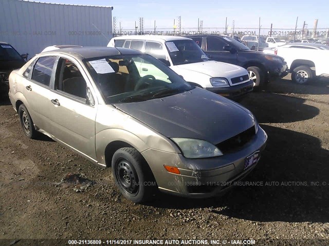 1FAFP34N85W127165 - 2005 FORD FOCUS ZX4 TAN photo 6