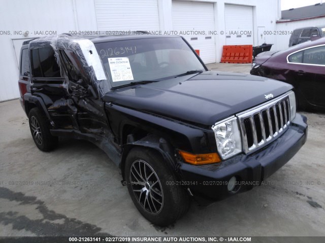 1J8HG48PX7C632898 - 2007 JEEP COMMANDER BLACK photo 1
