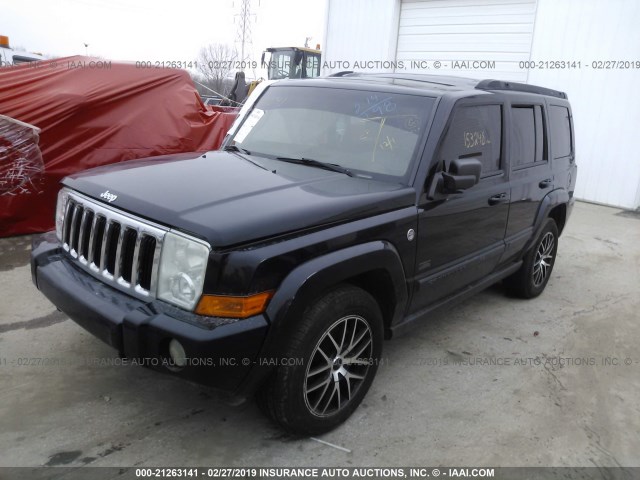 1J8HG48PX7C632898 - 2007 JEEP COMMANDER BLACK photo 2
