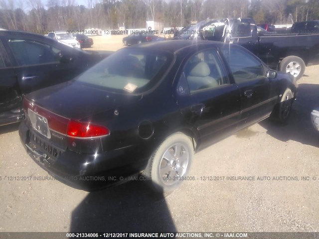 1MEFM66L9XK601567 - 1999 MERCURY MYSTIQUE LS BLACK photo 4