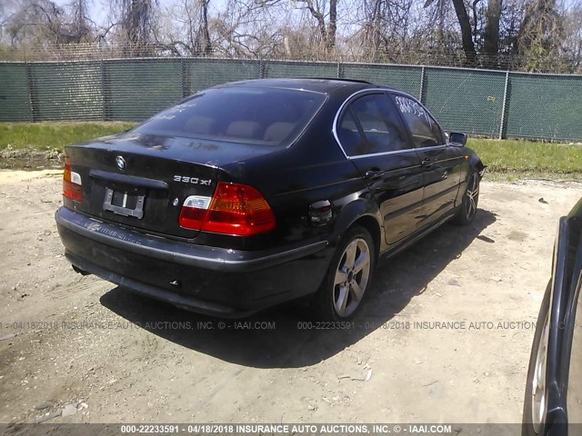 WBAEW53485PN39347 - 2005 BMW 330 XI BLACK photo 4