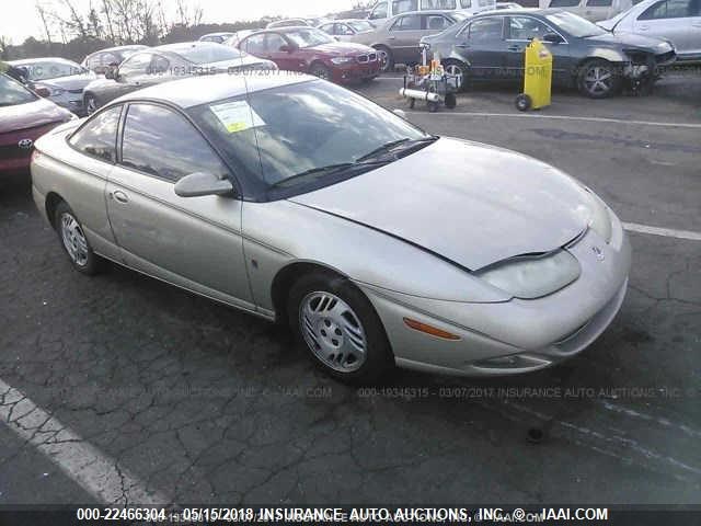 1G8ZY12771Z348952 - 2001 SATURN SC2 GOLD photo 1