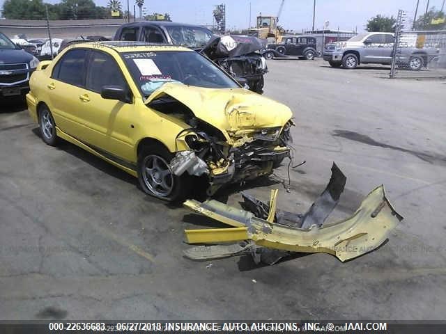 JA3AJ86E33U083762 - 2003 MITSUBISHI LANCER OZ RALLY YELLOW photo 1