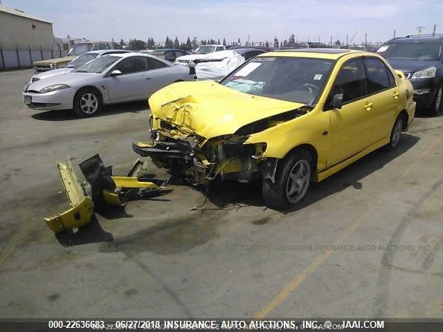 JA3AJ86E33U083762 - 2003 MITSUBISHI LANCER OZ RALLY YELLOW photo 2