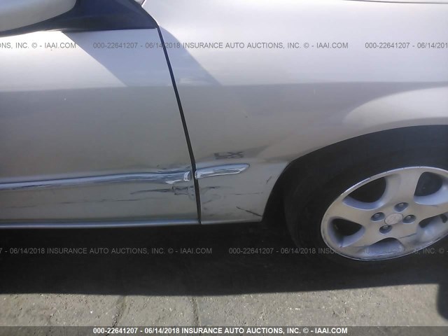 JM1BJ225310455503 - 2001 MAZDA PROTEGE LX/ES ოქროსფერი ფოტო 6