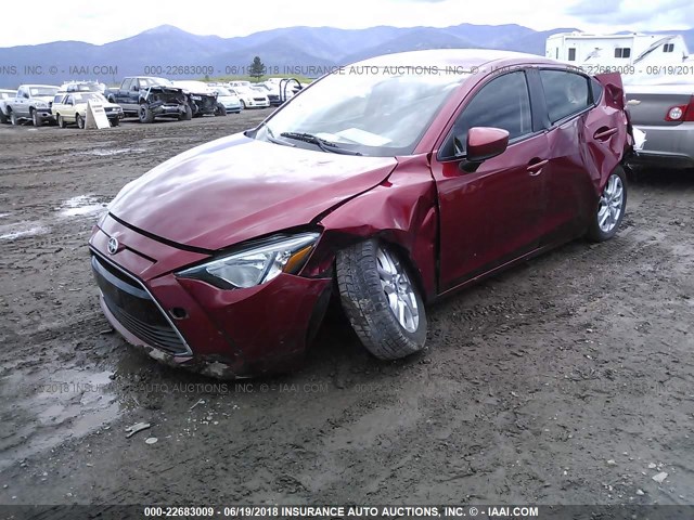 3MYDLBZV8GY107477 - 2016 TOYOTA SCION IA RED photo 2