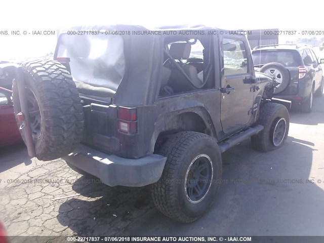 1J4AA2D11AL175271 - 2010 JEEP WRANGLER SPORT BLACK photo 4