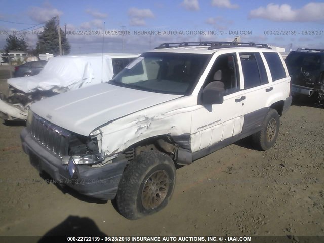 1J4GZ58Y9VC736379 - 1997 JEEP GRAND CHEROKEE LAREDO/TSI WHITE photo 2