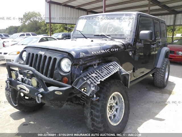 1J4HA6H12BL621039 - 2011 JEEP WRANGLER UNLIMITE RUBICON BLACK photo 2