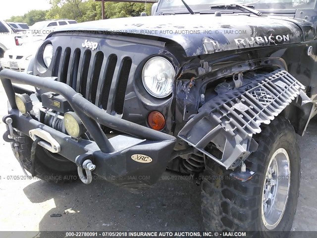 1J4HA6H12BL621039 - 2011 JEEP WRANGLER UNLIMITE RUBICON BLACK photo 6