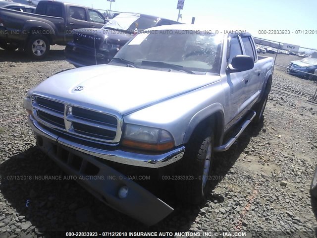 1D7HG48NX3S103303 - 2003 DODGE DAKOTA QUAD SLT SILVER photo 2