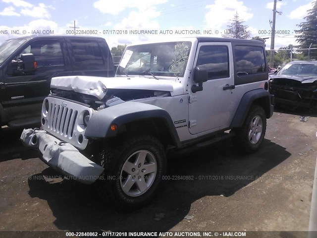 1J4AA2D10BL573718 - 2011 JEEP WRANGLER SPORT SILVER photo 2