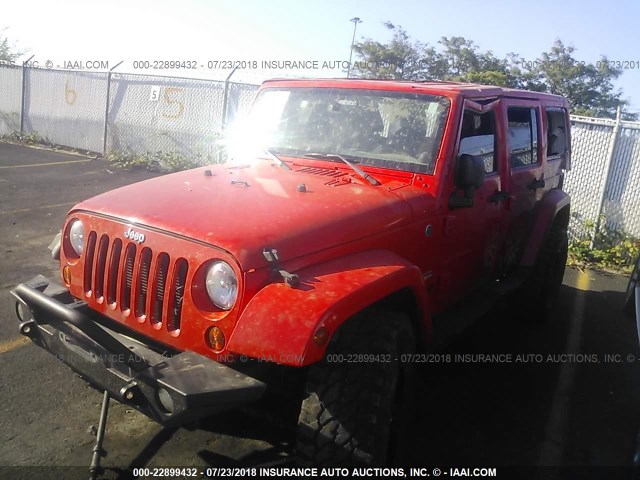 1C4BJWEG6DL617731 - 2013 JEEP WRANGLER UNLIMITE SAHARA RED photo 2