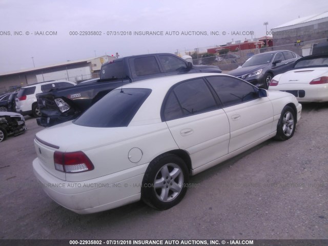 W06VR54R61R003548 - 2001 CADILLAC CATERA SPORT WHITE photo 4