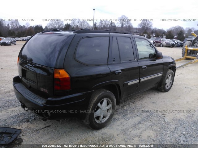 1GKDT13S822526786 - 2002 GMC ENVOY BLACK photo 4