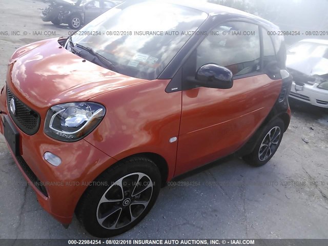 WMEFJ5DA5GK071654 - 2016 SMART FORTWO ORANGE photo 2