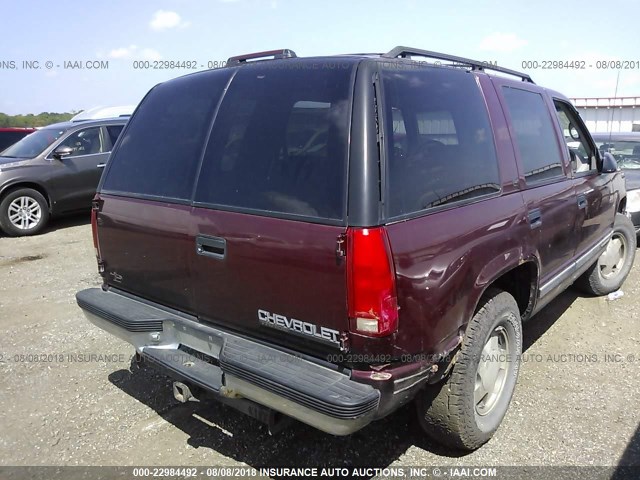 1GNEK13R7XJ332934 - 1999 CHEVROLET TAHOE K1500 RED photo 4