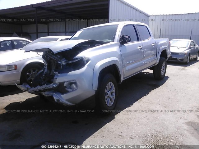 5TFAZ5CN5HX046943 - 2017 TOYOTA TACOMA DBL CAB/SR5/TRD SPORT/OR SILVER photo 2