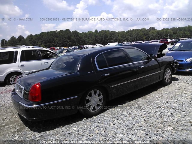 1LNHM84W77Y635499 - 2007 LINCOLN TOWN CAR EXECUTIVE L BLACK photo 4