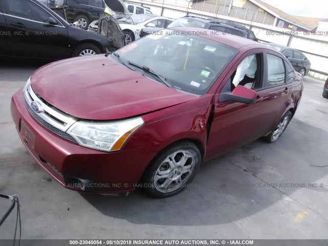 1FAHP36N09W173097 - 2009 FORD FOCUS SES RED photo 2