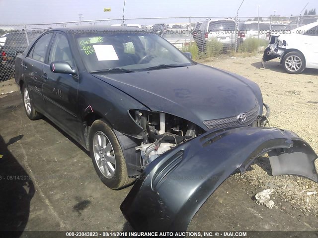 JTDBE30K720060552 - 2002 TOYOTA CAMRY LE/XLE/SE GREEN photo 1