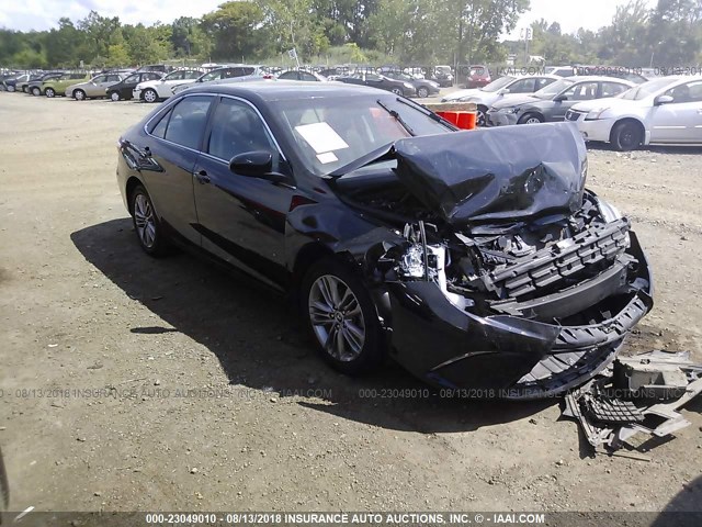 4T1BF1FK4GU557563 - 2016 TOYOTA CAMRY LE/XLE/SE/XSE BLACK photo 1