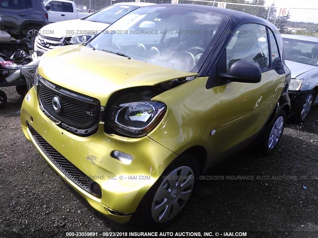 WMEFJ5DA8GK068165 - 2016 SMART FORTWO GREEN photo 2