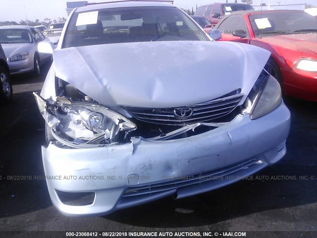 JTDBE32K063060958 - 2006 TOYOTA CAMRY LE/XLE Light Blue photo 6