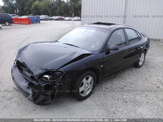 1FAHP56S72G124710 - 2002 FORD TAURUS SEL BLACK photo 2