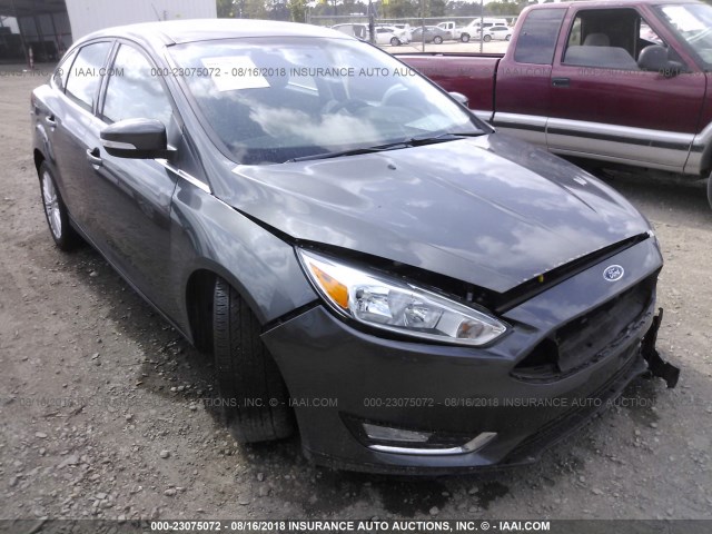 1FADP3J25FL252709 - 2015 FORD FOCUS TITANIUM GRAY photo 1