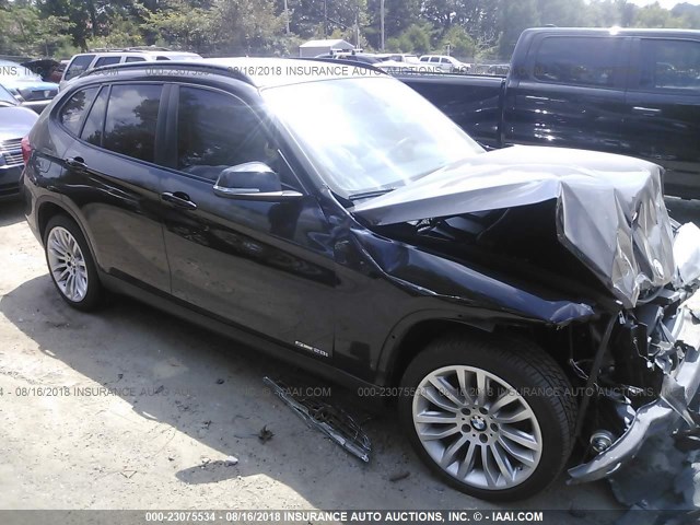 WBAVM1C59EVW49262 - 2014 BMW X1 BLACK photo 1