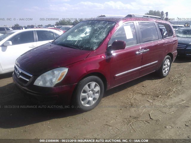 KNDMC233676037295 - 2007 HYUNDAI ENTOURAGE GLS/SE/LIMITED RED photo 2