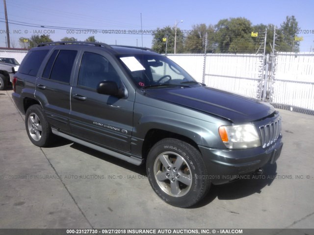 1J8GW68J22C322436 - 2002 JEEP GRAND CHEROKEE OVERLAND GRAY photo 1