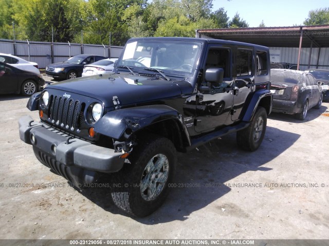 1J4GA59159L744154 - 2009 JEEP WRANGLER UNLIMITE SAHARA BLACK photo 2