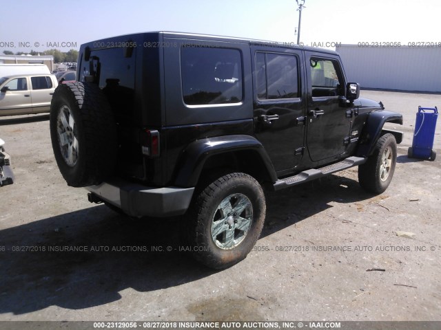 1J4GA59159L744154 - 2009 JEEP WRANGLER UNLIMITE SAHARA BLACK photo 4