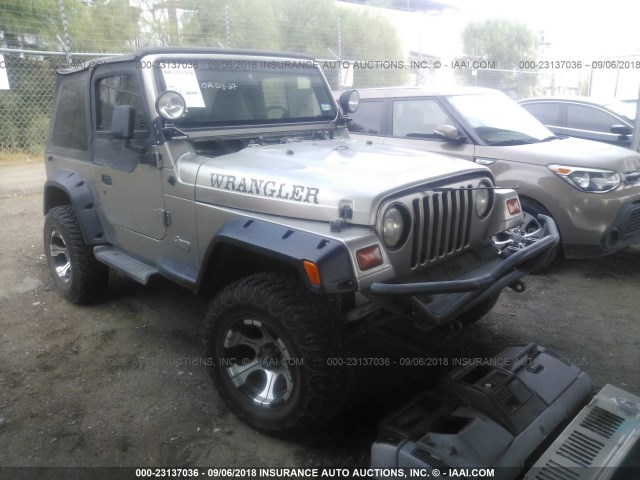 1J4FY29PXVP493158 - 1997 JEEP WRANGLER / TJ SE BEIGE photo 1