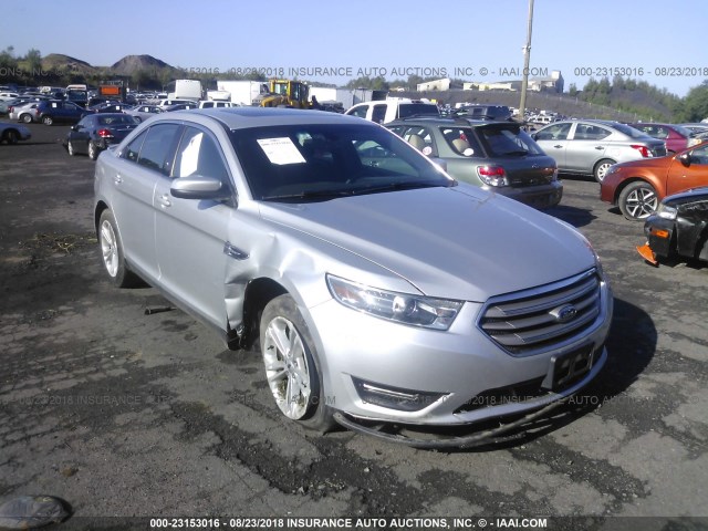 1FAHP2E83HG130307 - 2017 FORD TAURUS SEL SILVER photo 1