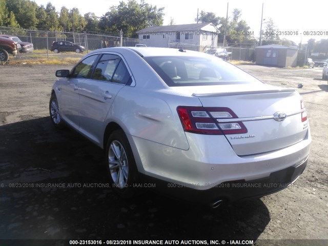 1FAHP2E83HG130307 - 2017 FORD TAURUS SEL SILVER photo 3